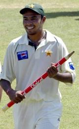 Danish Kaneria is all smiles after starring in Pakistan's comprehensive win in Jamaica © AFP