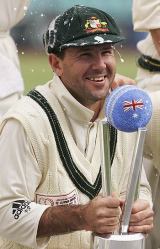 Ricky Ponting  poses with the trophy after Australia thrashed the World XI by 210 runs in the Super Test at Sydney © Getty Images