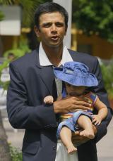 Rahul Dravid poses with his son Samit after India clinched a rare series win outside the subcontinent, in West Indies © Getty Images