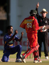 The end draws near ... Nuwan Kulasekara celebrates dismissing Prosper Utseya as Zimbabwe threw away a chance to win the final ODI against Sri Lanka © ESPNcricinfo Ltd