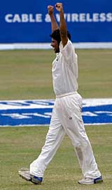 Ramnaresh Sarwan - who was named Man of the Match - celebrates taking the final wicket as West Indies won by an innings at Sabina Park © AFP